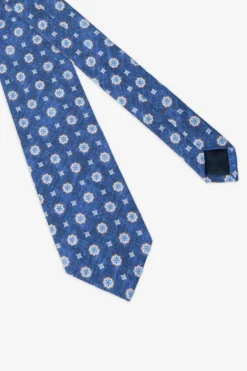 Cravatta disegno geometrico blu