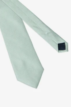 Cravatta jacquard fantasia geometrica verde