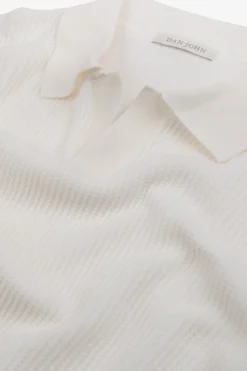 Polo in maglia collo aperto armaturata panna