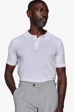 Polo in maglia punto dadino bianca